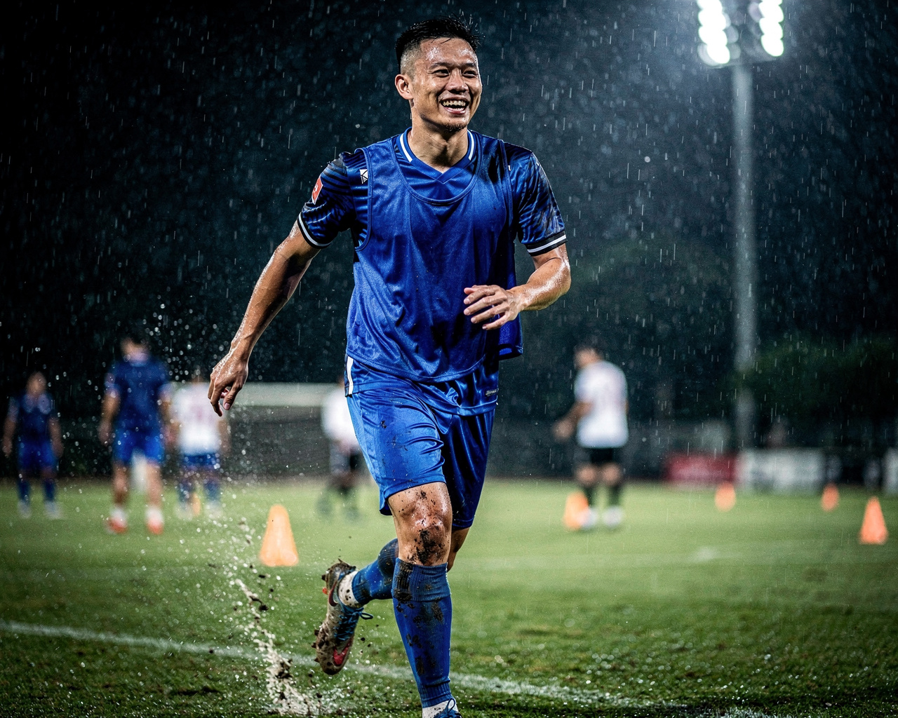 Laughing through monsoon training rain
